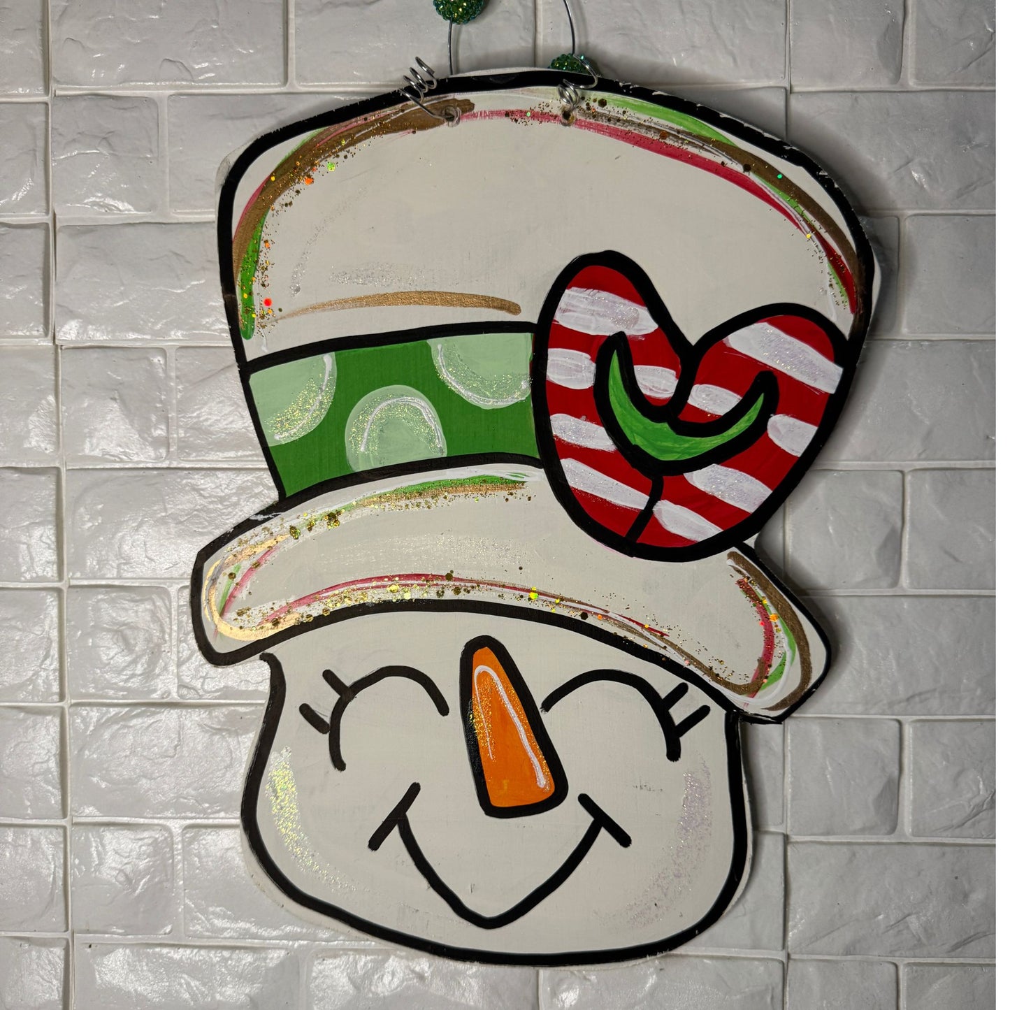Hand-Painted Snowman Head Door Hanger – Festive Christmas Décor with a Candy Cane Heart Hat
