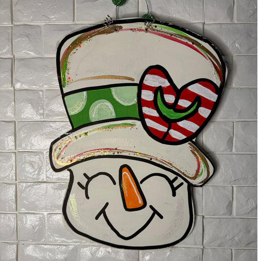 Hand-Painted Snowman Head Door Hanger – Festive Christmas Décor with a Candy Cane Heart Hat